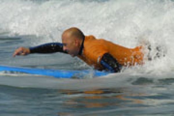 man surfing beaches Adelaide