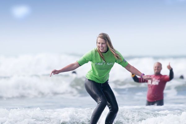 girl happy with her surf lessons Australia